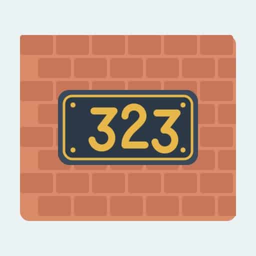 Illustration of a dark house-number plaque reading 323 on a brick wall